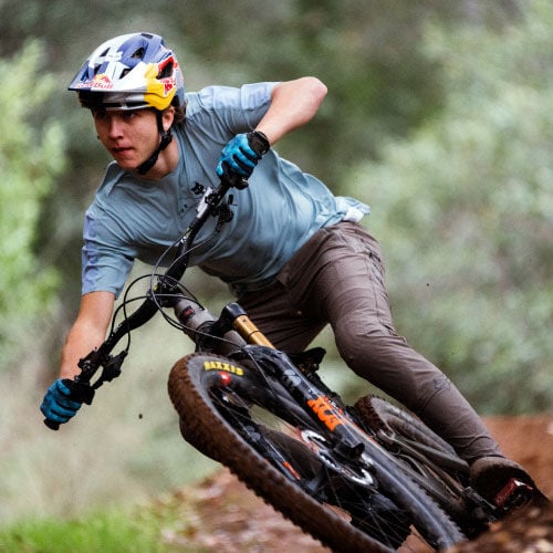 Jackson Goldstone riding a mountain bike.