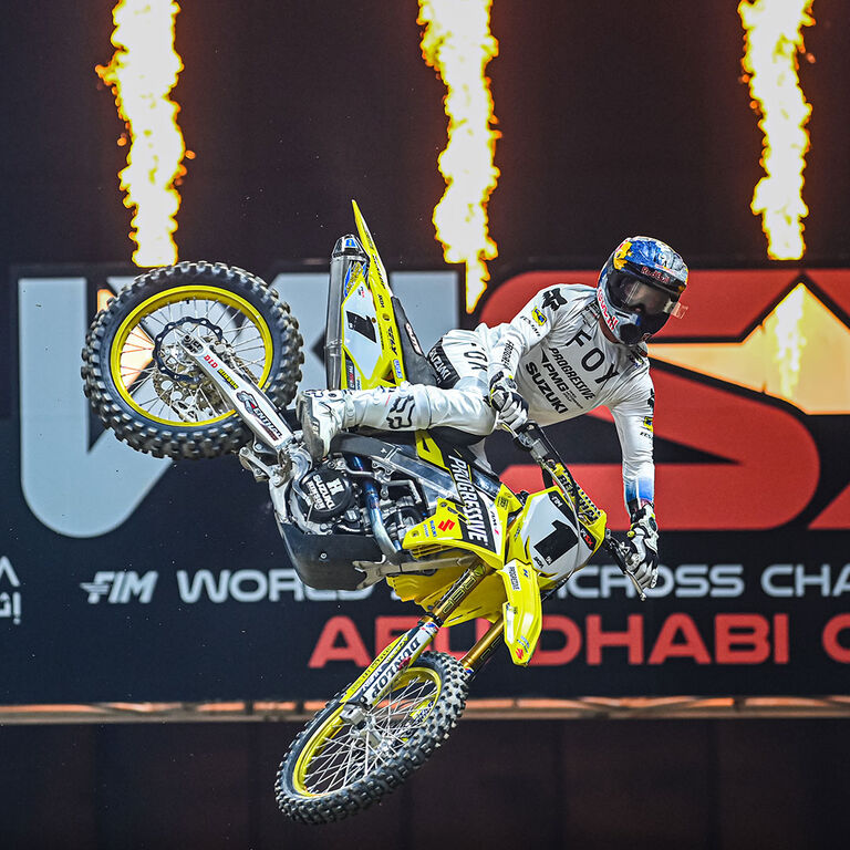 Ken Roczen taking a jump on dirt bike wearing KR94 collection